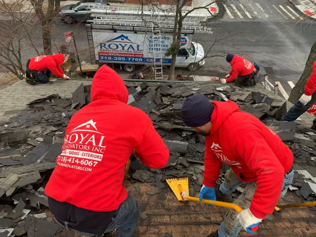 Royal Roofers On Bronx Flat Roof With Hoodies