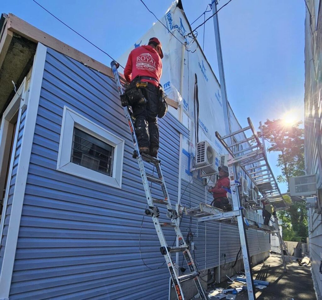 Siding in Queens, NYC put on by Royal Roofing Team